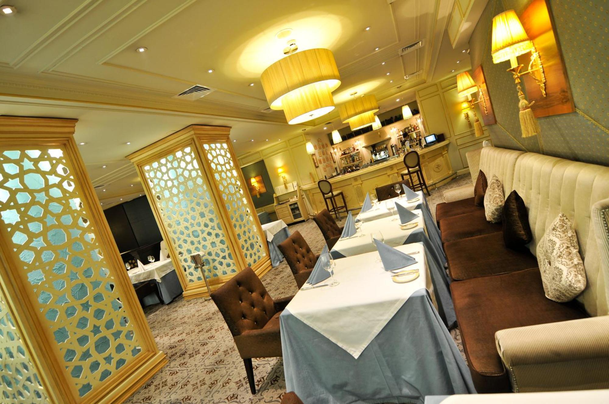 Grand Tien Shan Hotel อัลมาตี ร้านอาหาร รูปภาพ