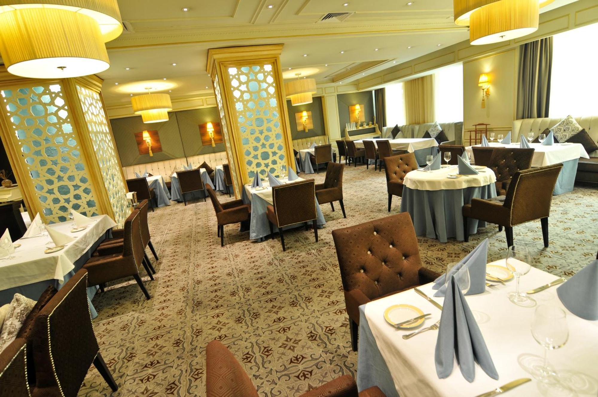 Grand Tien Shan Hotel อัลมาตี ร้านอาหาร รูปภาพ